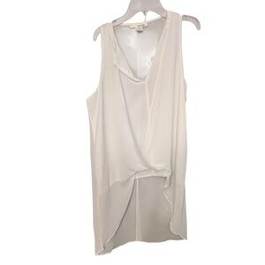 Sans Souci size medium white sleeveless semi sheer high low top